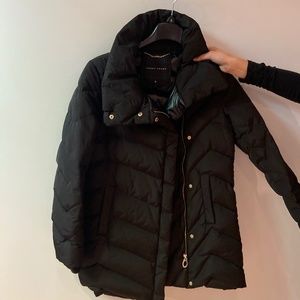 Black puffer jacket (mid-length)